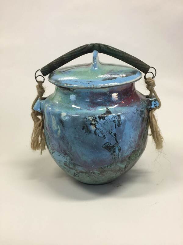 turquoise raku fired pot with metal spring lid tie-down